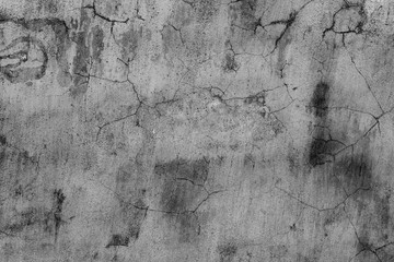 Wall fragment with scratches and cracks