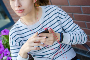 Young woman listening to music