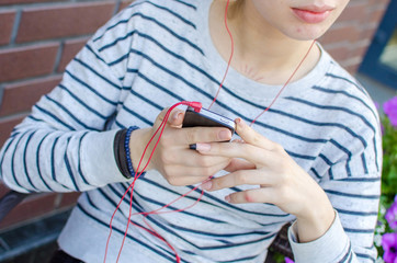 Young woman listening to music