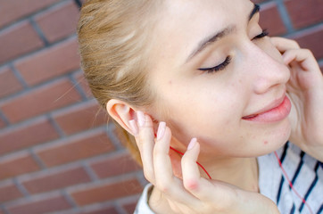 Young woman listening to music