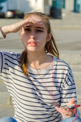 Young woman listening to music