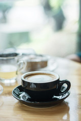 Soft focus on latte coffee cup, coffee for background - vintage