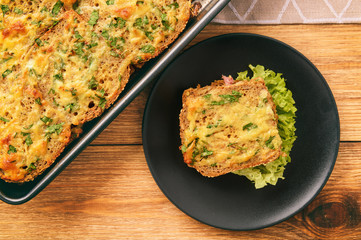 Hot sandwiches - bread baked in oven with ham and cheese.