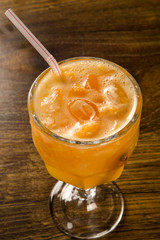 Tangerine Fruit Caipirinha of Brazil on wooden background