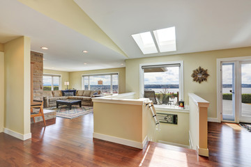 Open plan house interior with hardwood floor
