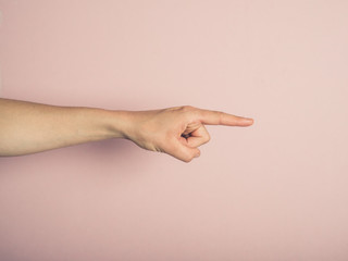 Female hand pointing