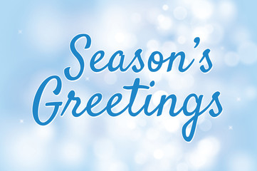 Season's greetings with blue bokeh background for christmas them © kaisorn