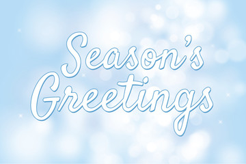 Naklejka na ściany i meble Season's greetings with blue bokeh background for christmas them
