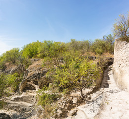 Fototapeta na wymiar Medieval cave city-fortress Chufut-Kale, Bakhchysarai, Republic of Crimea, Russia. Carved into the rock of the premises