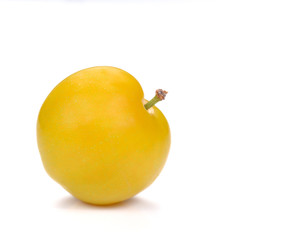 Yellow Ripe plum on white background.