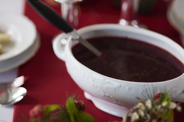Vase full of beetroot soup