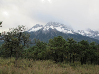 Obraz premium View of Jade Dragon Snow Mountain. Jade Dragon Snow Mountain is a mountain near Lijiang, in Yunnan province, southwestern China.