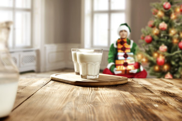 Fototapeta na wymiar milk and wooden desk space 