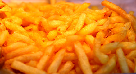 Healthy Homemade Baked Sweet yellow Potato Fries close up patterns