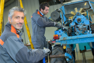 fixing a tractor