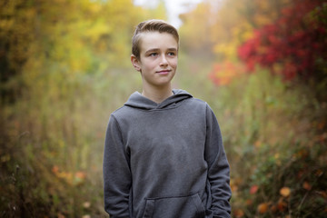 preteen boy in fall time