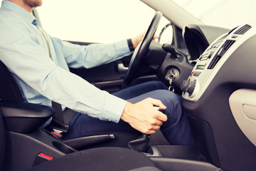 close up of young man driving car