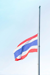 Lowering the flag at half-mast to mourn