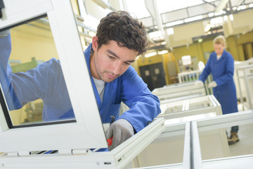 People working in window factory