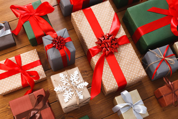 Lots of Gift boxes on wood, christmas presents in paper