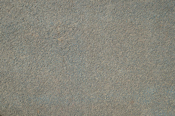 Gray and grainy texture of asphalt road for background.
