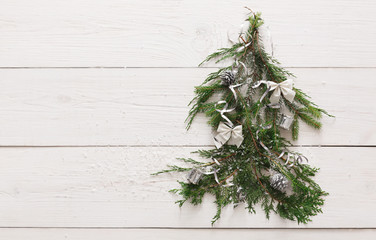 Christmas tree background at white wood with copy space