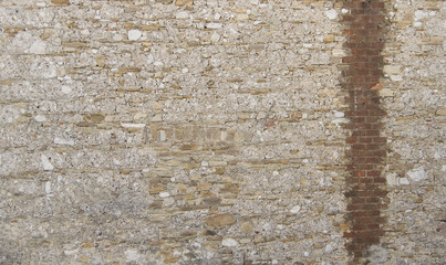 Vintage brick and stone wall, background texture