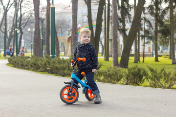 Little boy on the run bike