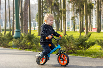 Little boy on the run bike