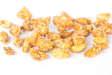 Closeup Caramel Coated Peanut with Sesame on white background