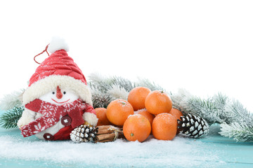 Fototapeta na wymiar Christmas Background, snow, spruce, tangerines, mockup