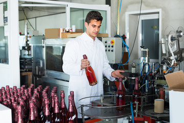 man working on wine production