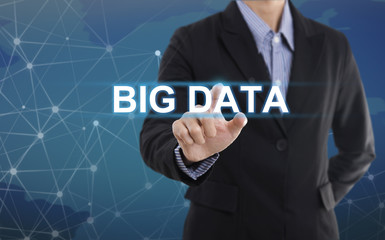 Businessman hand pressing button big data. sign on virtual screen.business concept.
