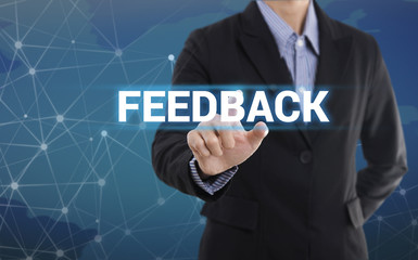 Businessman hand pressing button feedback. sign on virtual screen.business concept.