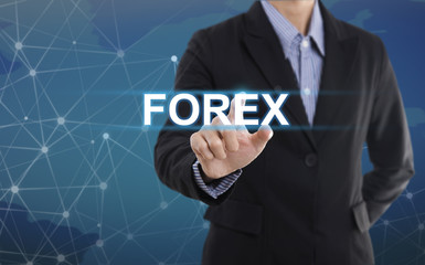 Businessman hand pressing button forex. sign on virtual screen.business concept.