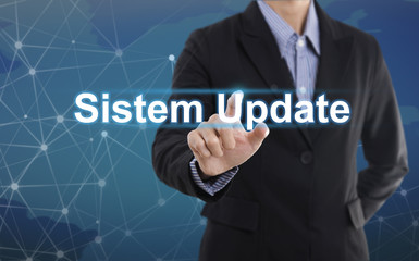Businessman hand pressing button sistem update. sign on virtual screen.business concept.
