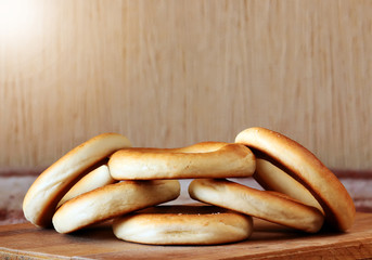 National Russian bagels on a wooden board and  plaid