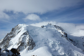 Fototapeta na wymiar Snow-covered peak of Mont Blanc from the observation deck Aiguille du Midi, Chamonix, France