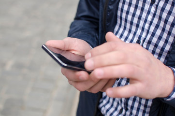 Young man using his phone