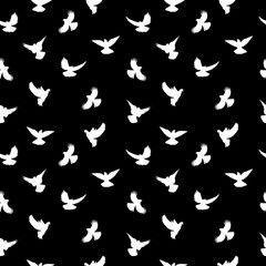 Birds silhouettes - flying seamless pattern. Black and white.
