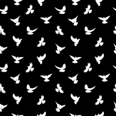 Birds silhouettes - flying seamless pattern. Black and white.
