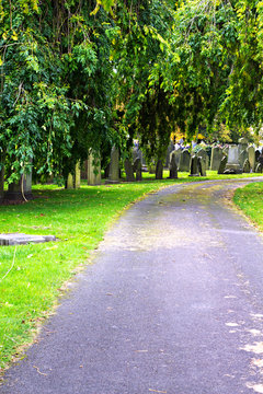 Pathway through old gravestones in an ancient cemetery