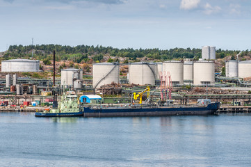 Fototapeta na wymiar Tanker with oil storage