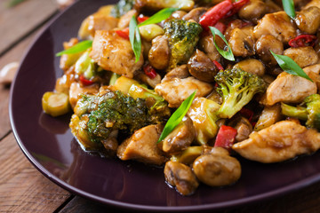 Stir fry with chicken, mushrooms, broccoli and peppers - Chinese food