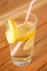 lemonade in a glass on wooden table