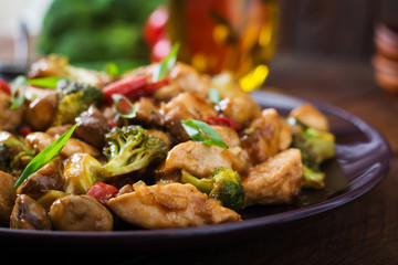 Stir fry with chicken, mushrooms, broccoli and peppers - Chinese food