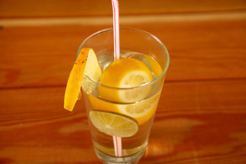 lemonade in a glass on wooden table
