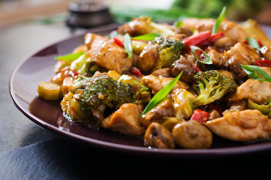 Stir fry with chicken, mushrooms, broccoli and peppers - Chinese food