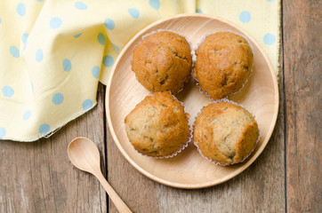 Banana muffins cupcake on wooden background