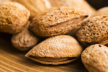 Heap of almond nuts in shell